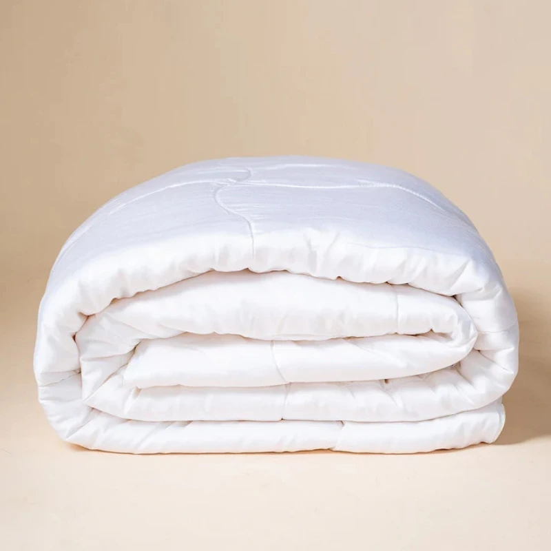 NakedLab Anti-Allergy Bamboo Duvet neatly folded, vegan plant-based duvet for allergy sufferers.