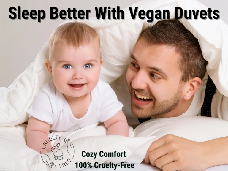 Happy parent and baby bonding under a cozy white vegan duvet, highlighting comfort and cruelty-free sleep for families.